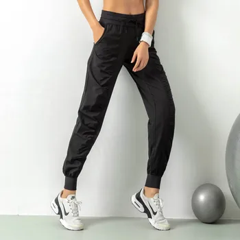 Tekaški športni vrvico, tek ohlapna žensk hitro sušenje športne fitnes sweatpants so tanjši z dveh strani žepi